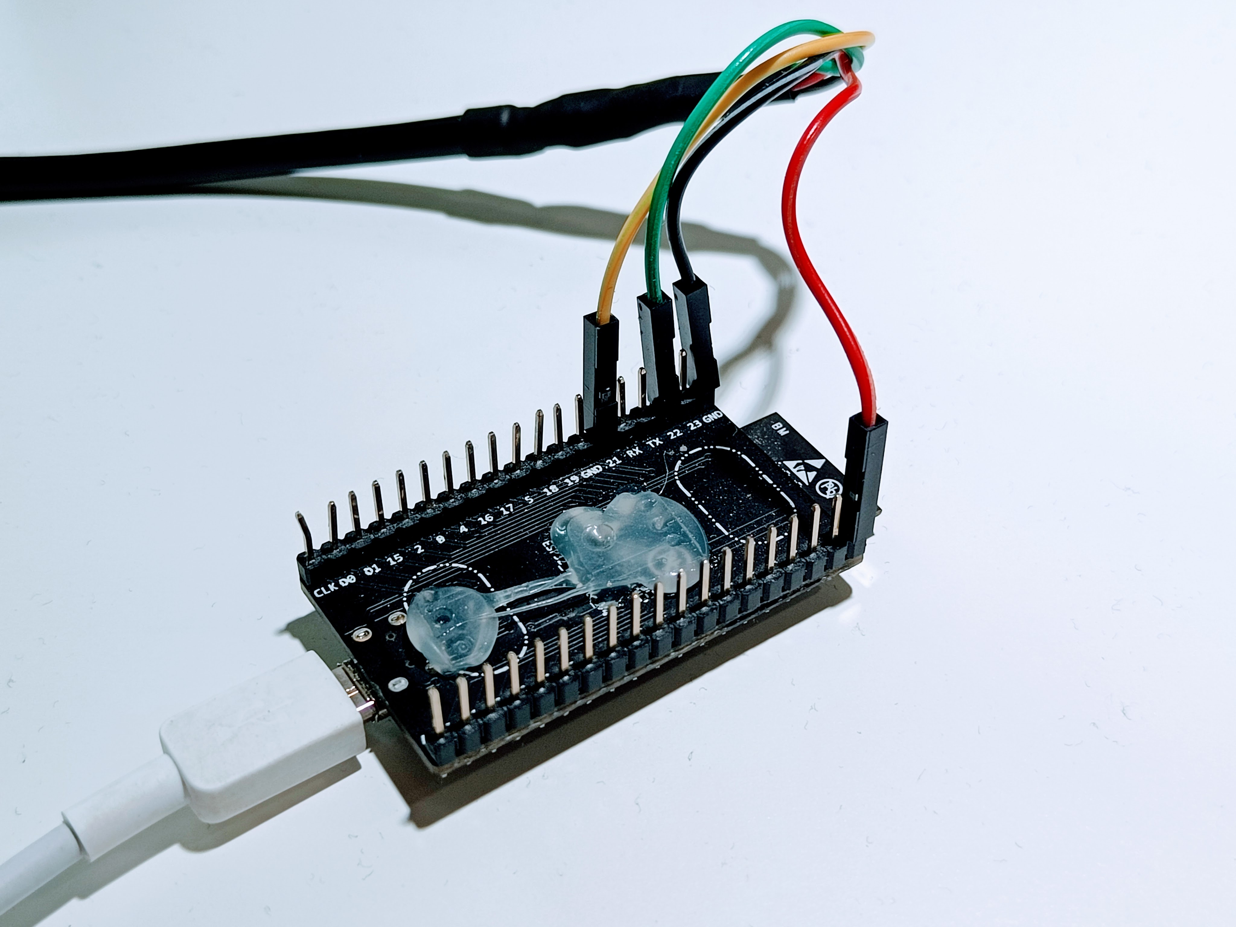 ESP32 Dev Module connected to an SHT41 sensor cable with female jumper connectors